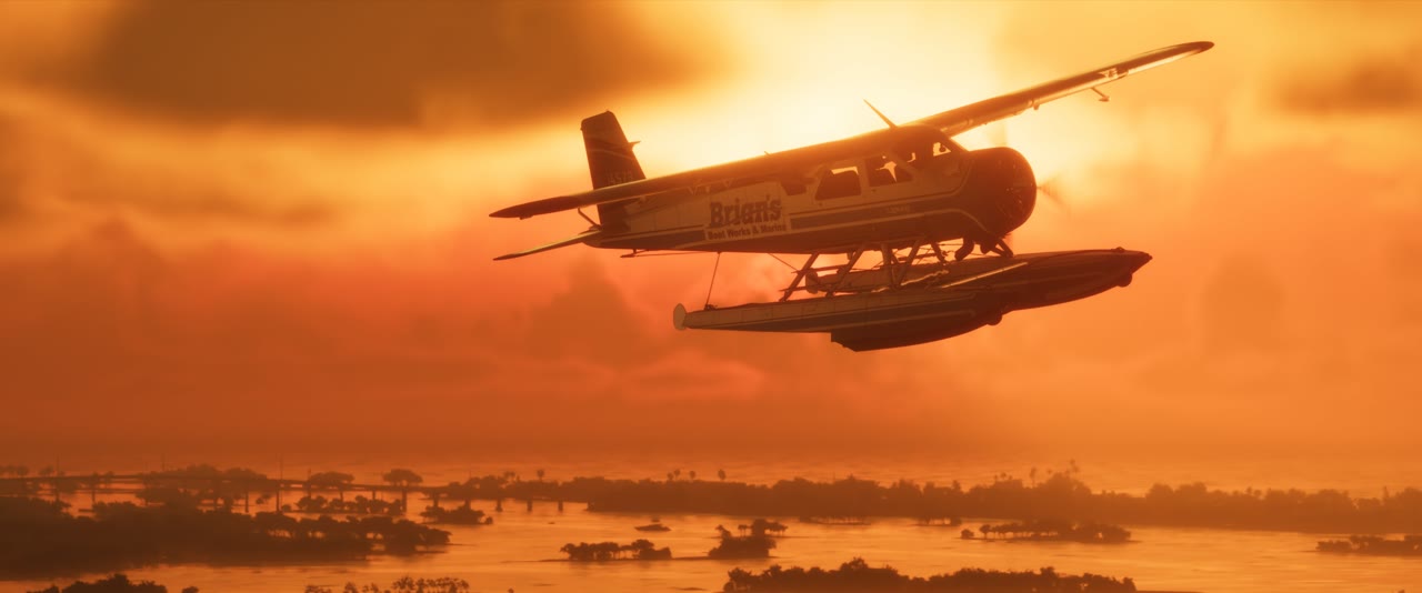 A floatplane flies over the Grassrivers wetlands at sunset