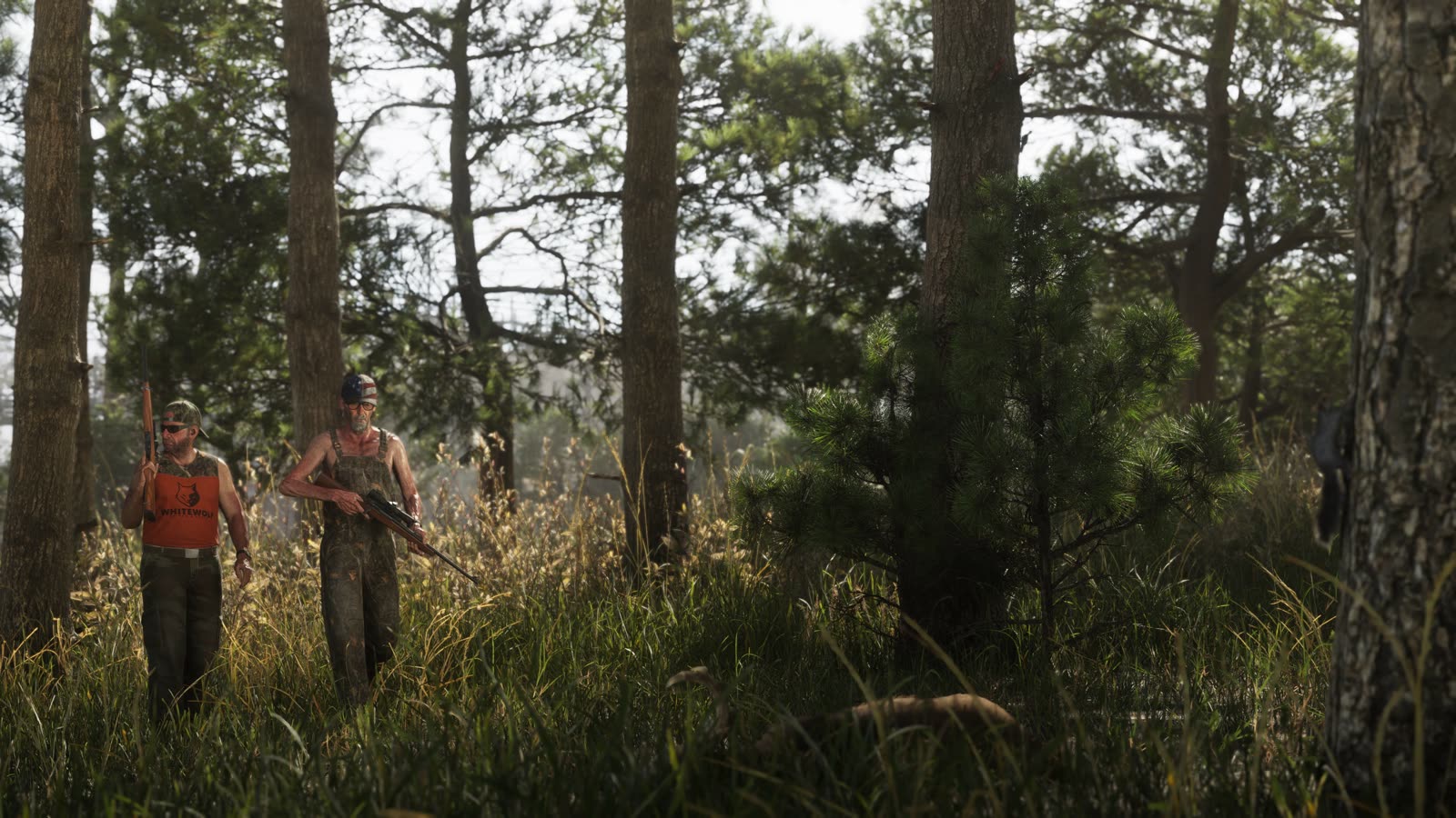 Two men with rifles walk through pine woods in Mount Kalaga