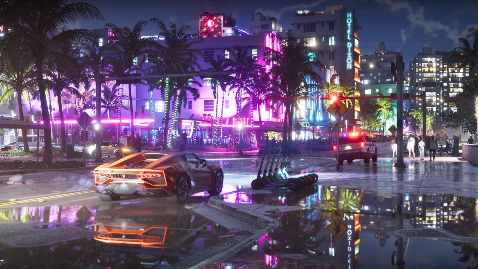 A Vice City street at night after rain, with an orange supercar outside the Ocean View Hotel
